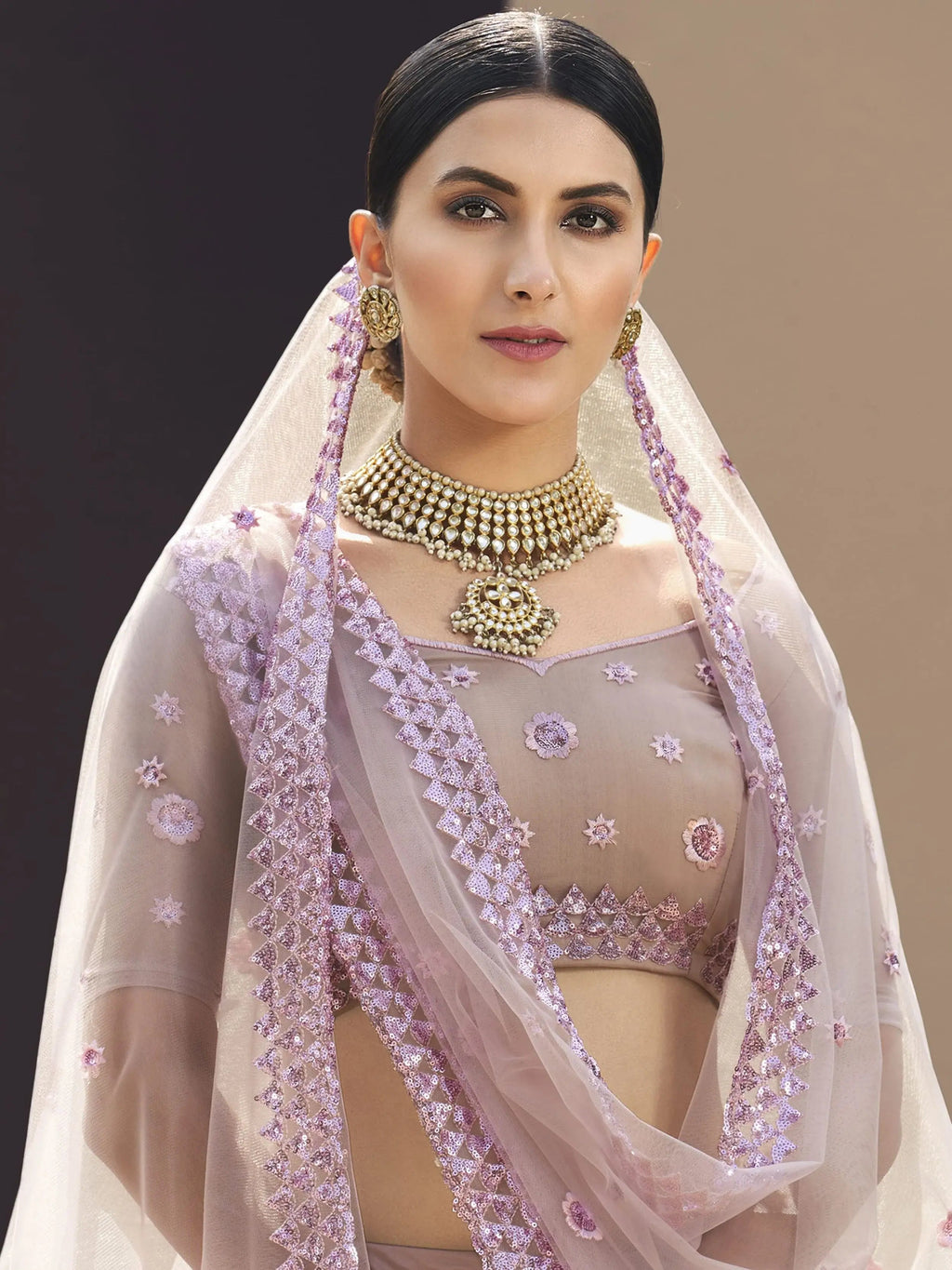 Elegant Lilac Net Embroidered Engagement Wear Lehenga Choli