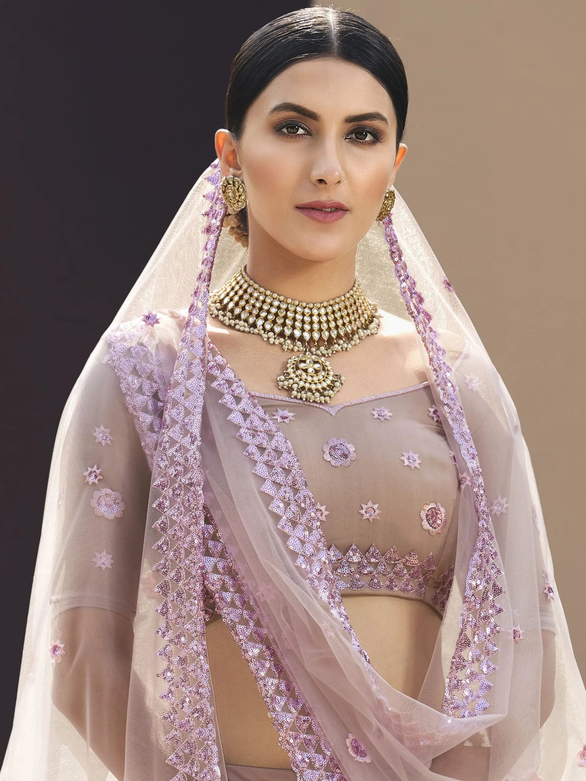 Elegant Lilac Net Embroidered Engagement Wear Lehenga Choli
