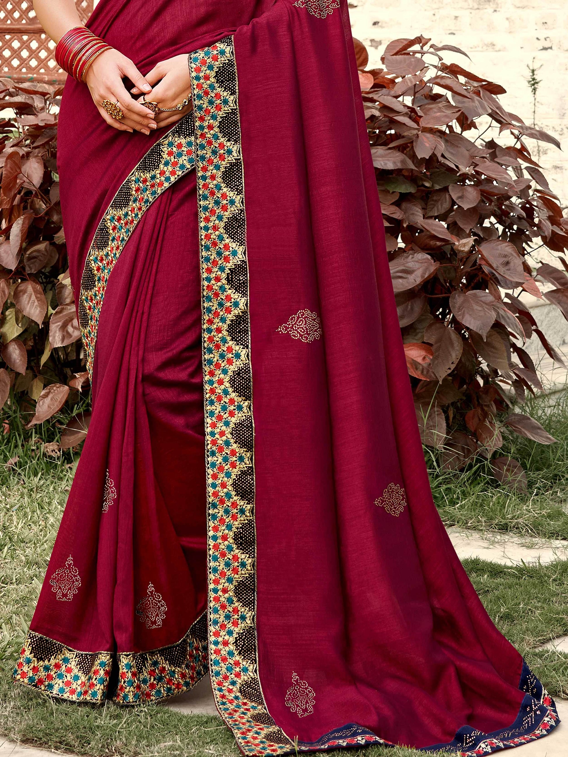 Tantalizing Maroon Georgette Swarovski Work Traditional Saree
