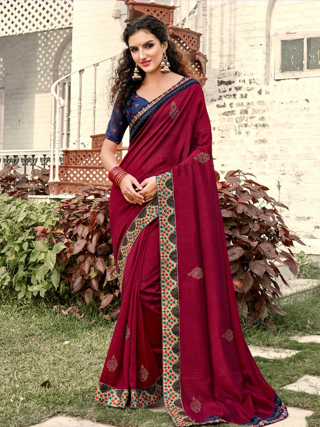 Tantalizing Maroon Georgette Swarovski Work Traditional Saree