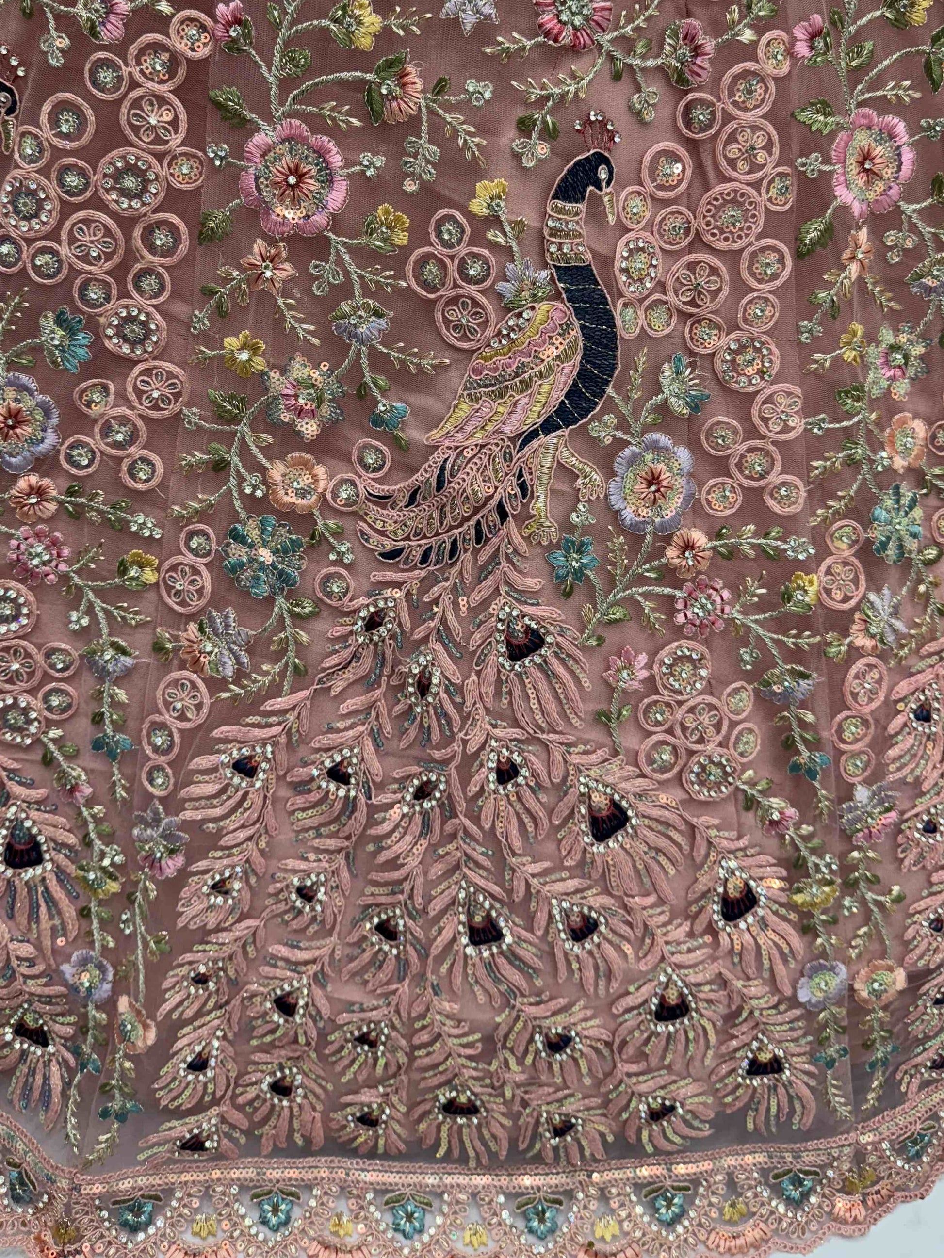 Magnetic Peach Net Sequins Wedding Wear Lehenga Choli With Dupatta