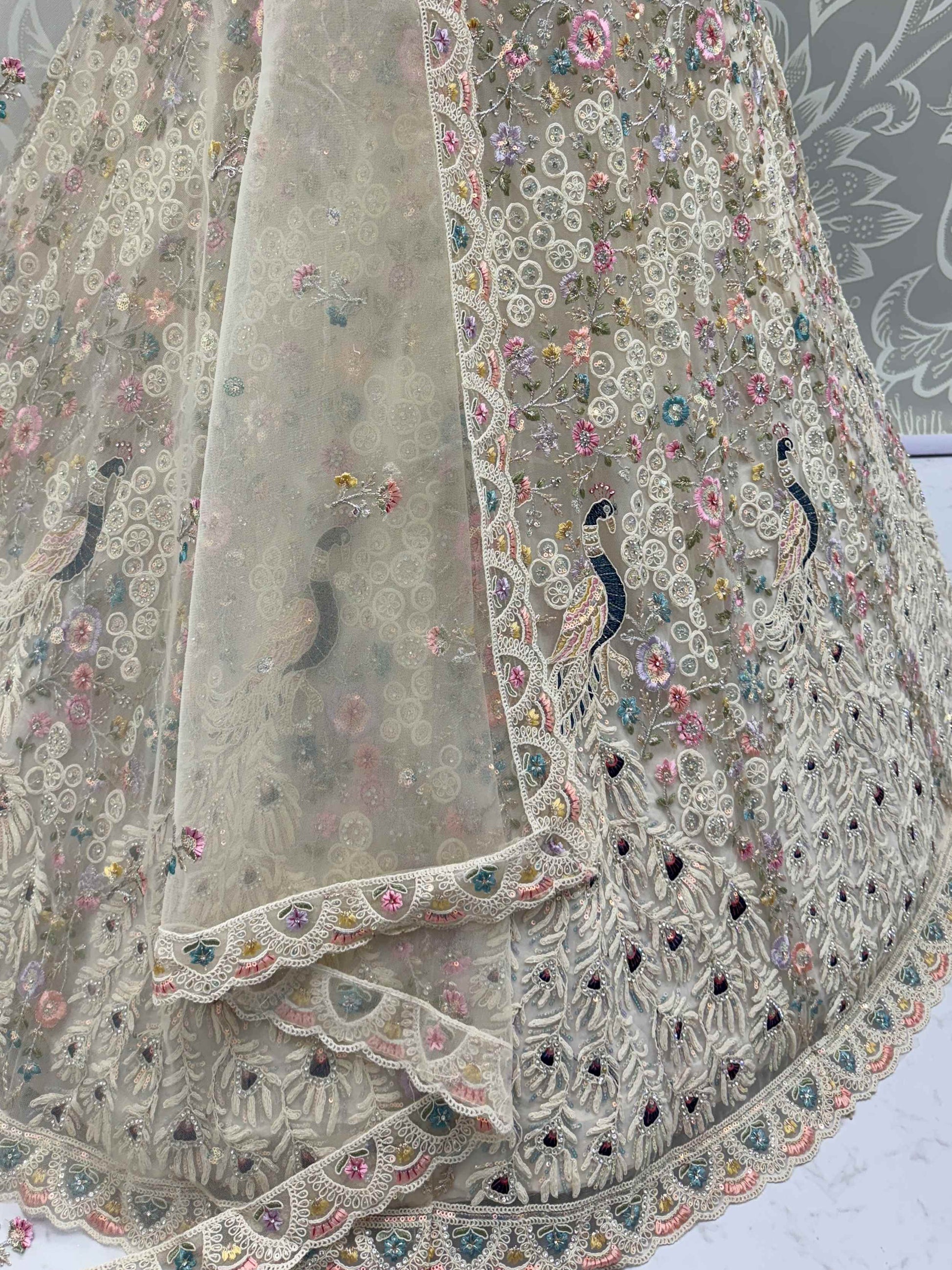 Astonishing White Net Zircon Work Engagement Wear Lehenga Choli