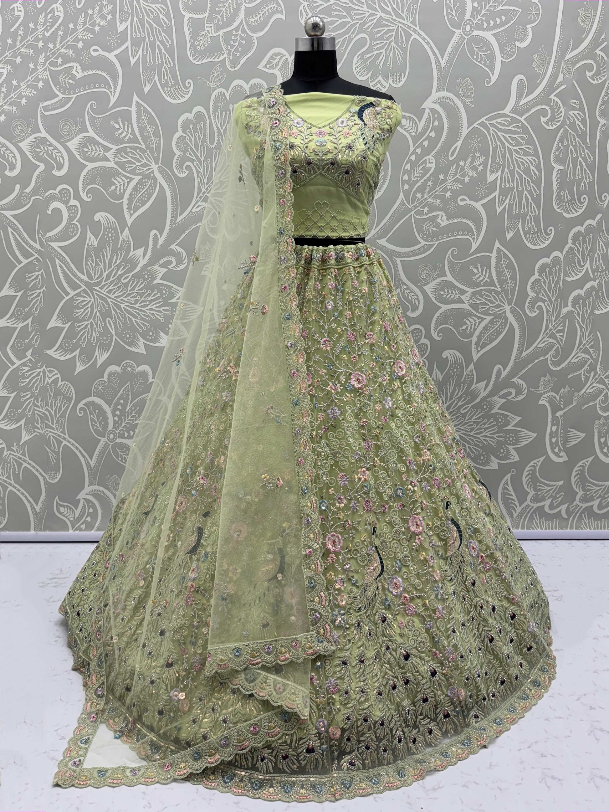Exquisite Green Net Floral Embroidered Mehendi Wear Lehenga Choli