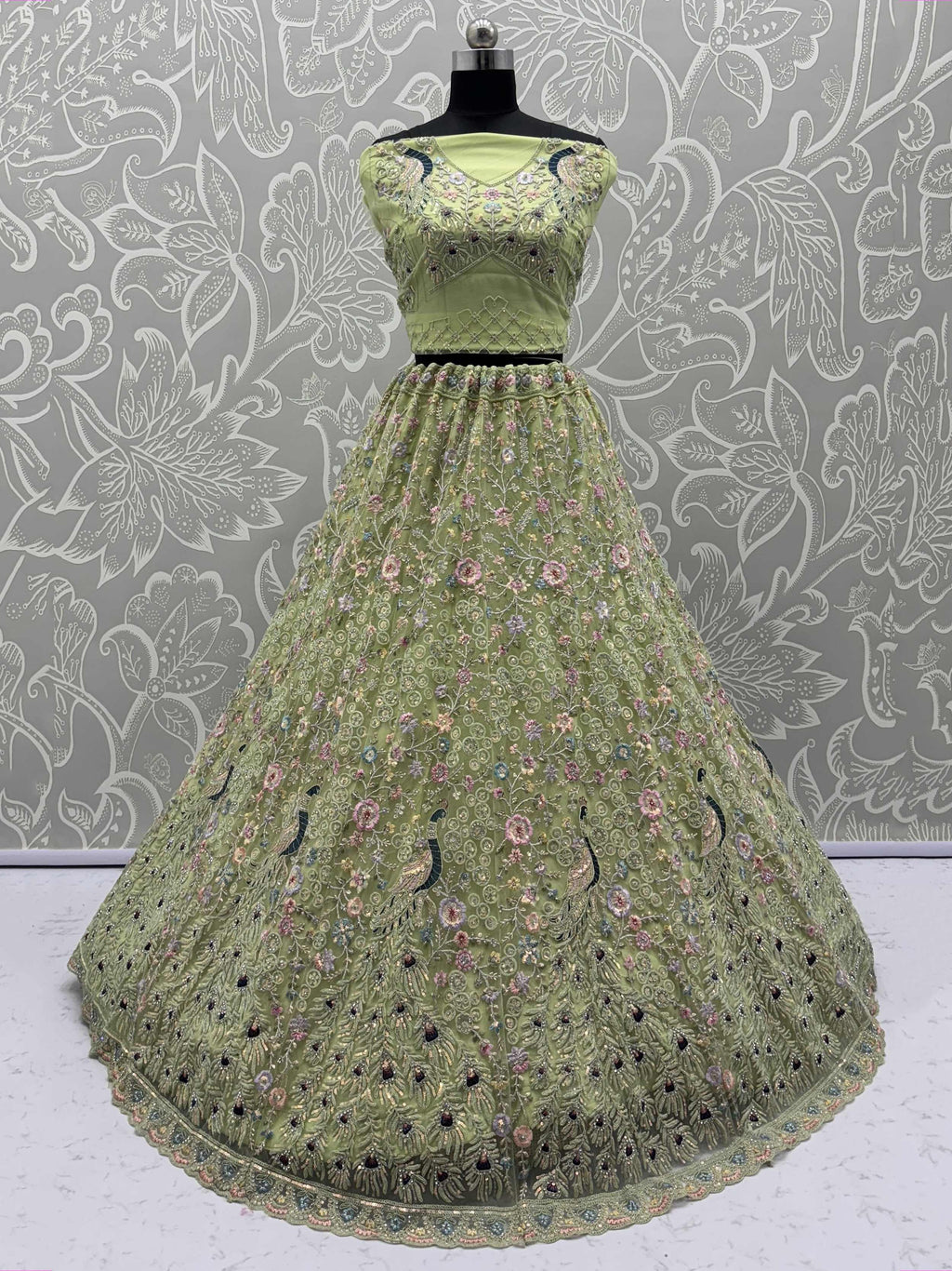 Exquisite Green Net Floral Embroidered Mehendi Wear Lehenga Choli