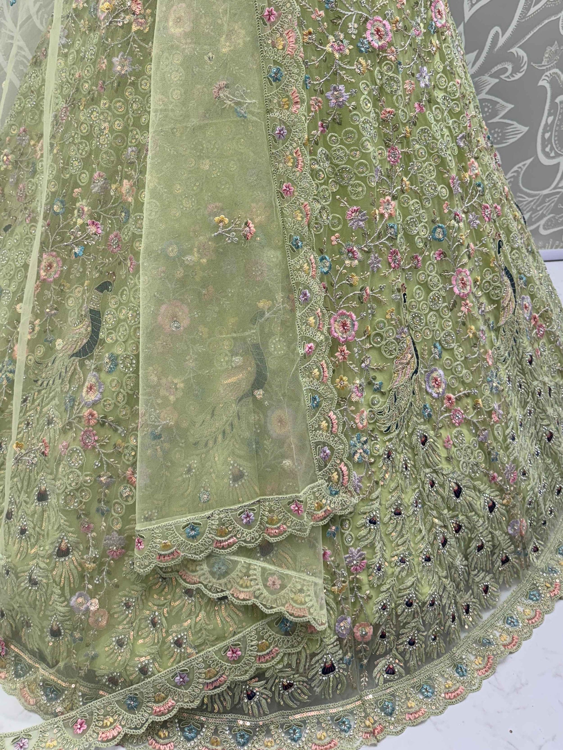 Exquisite Green Net Floral Embroidered Mehendi Wear Lehenga Choli