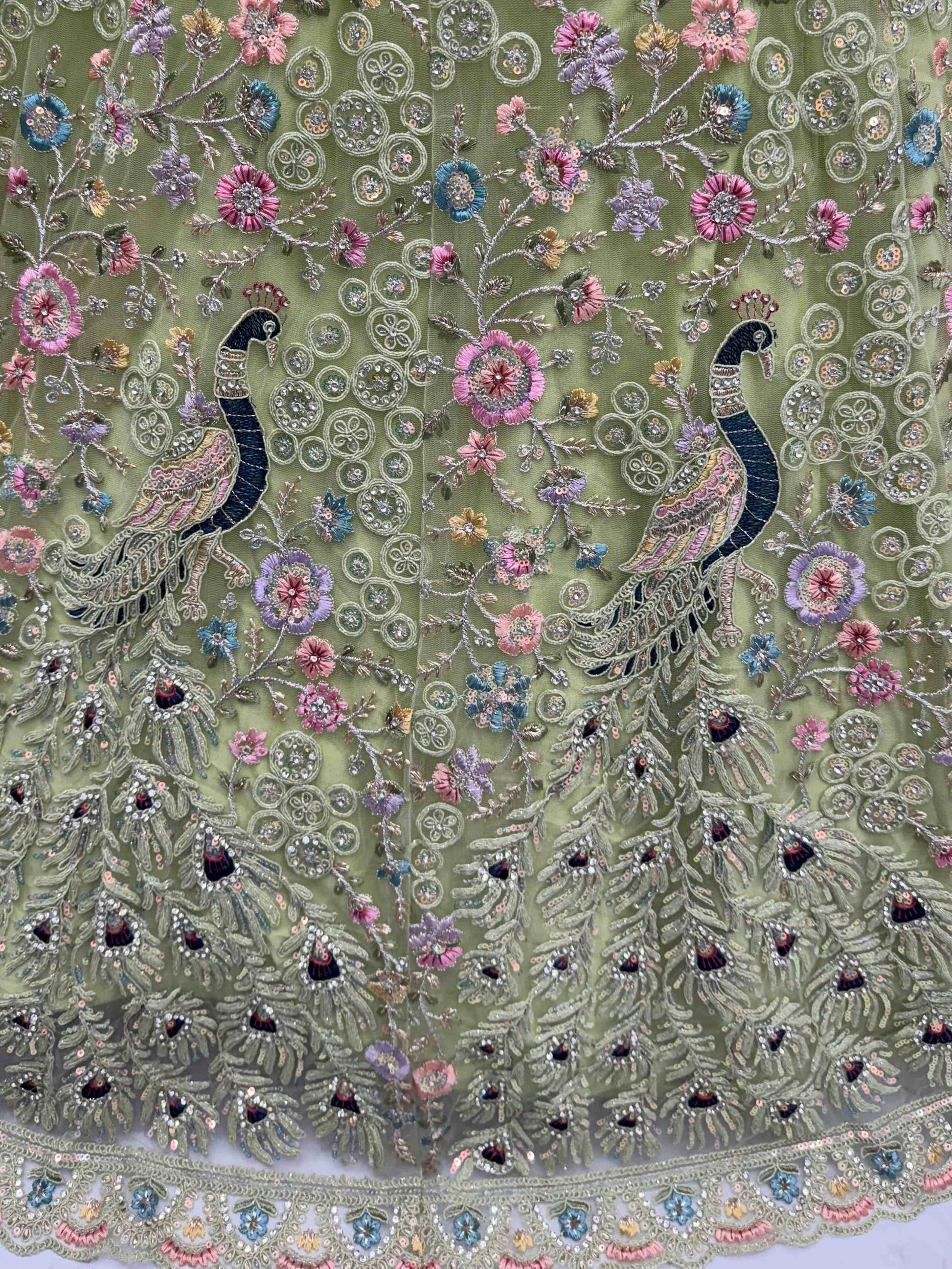 Exquisite Green Net Floral Embroidered Mehendi Wear Lehenga Choli