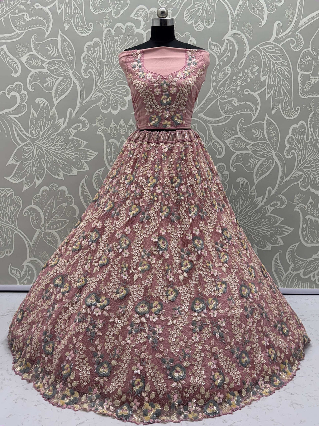 Tantalizing Pink Net Sequins Engagement Wear Lehenga Choli