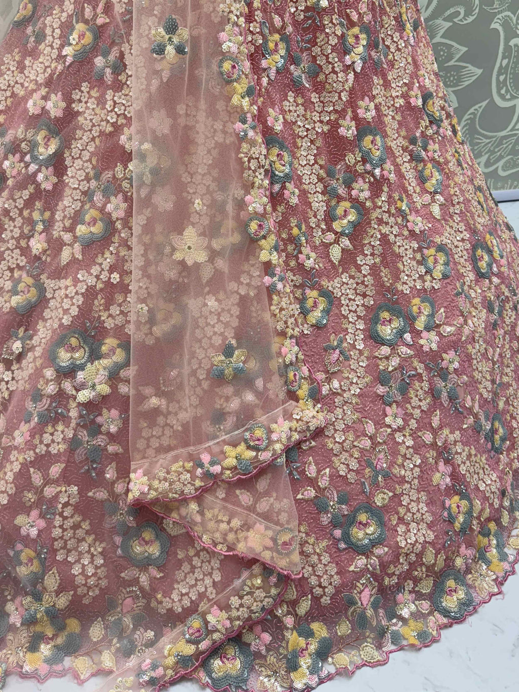 Tantalizing Pink Net Sequins Engagement Wear Lehenga Choli