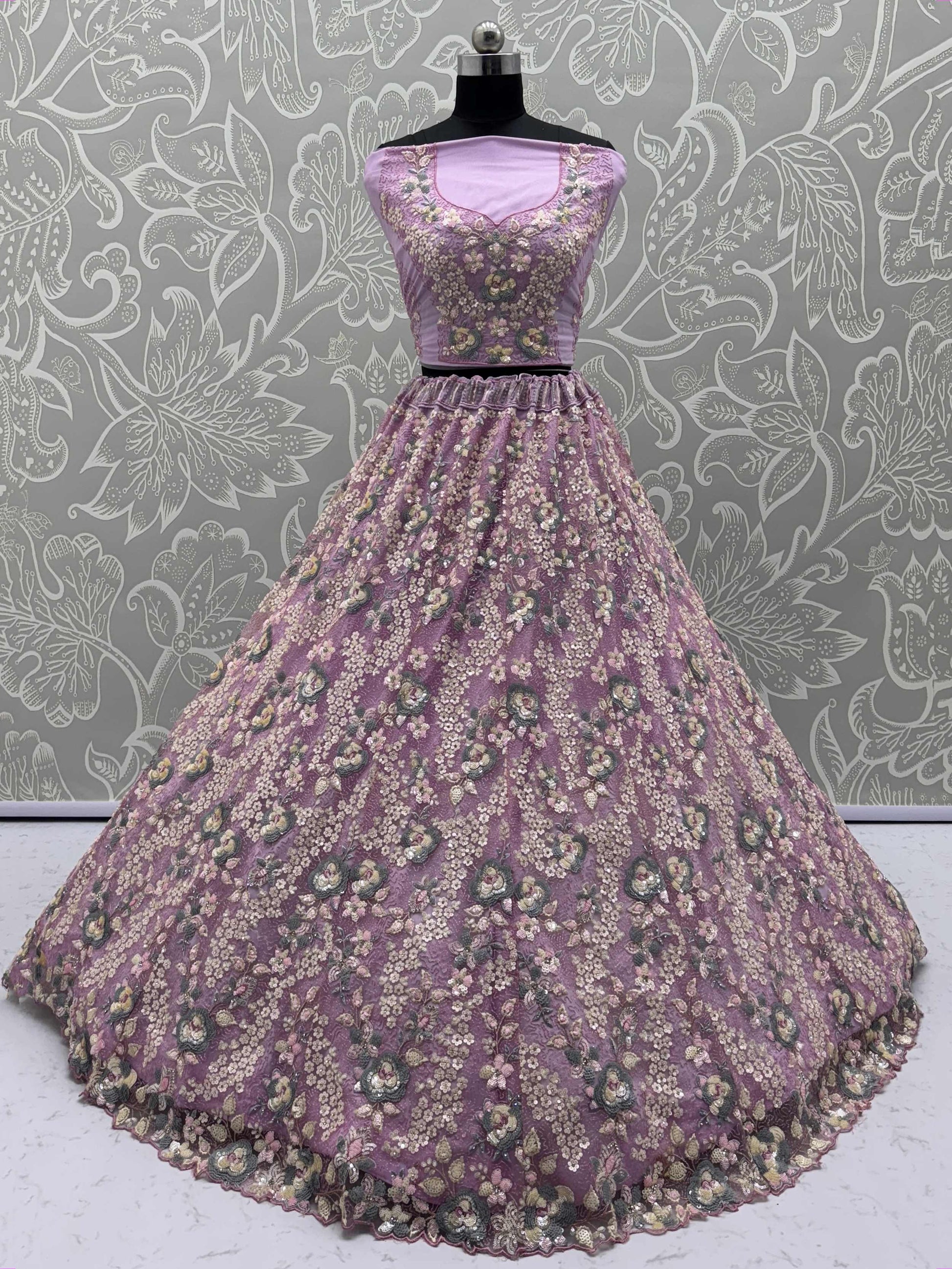 Spectacular Lilac Net Floral Embroidered Function Wear Lehenga Choli