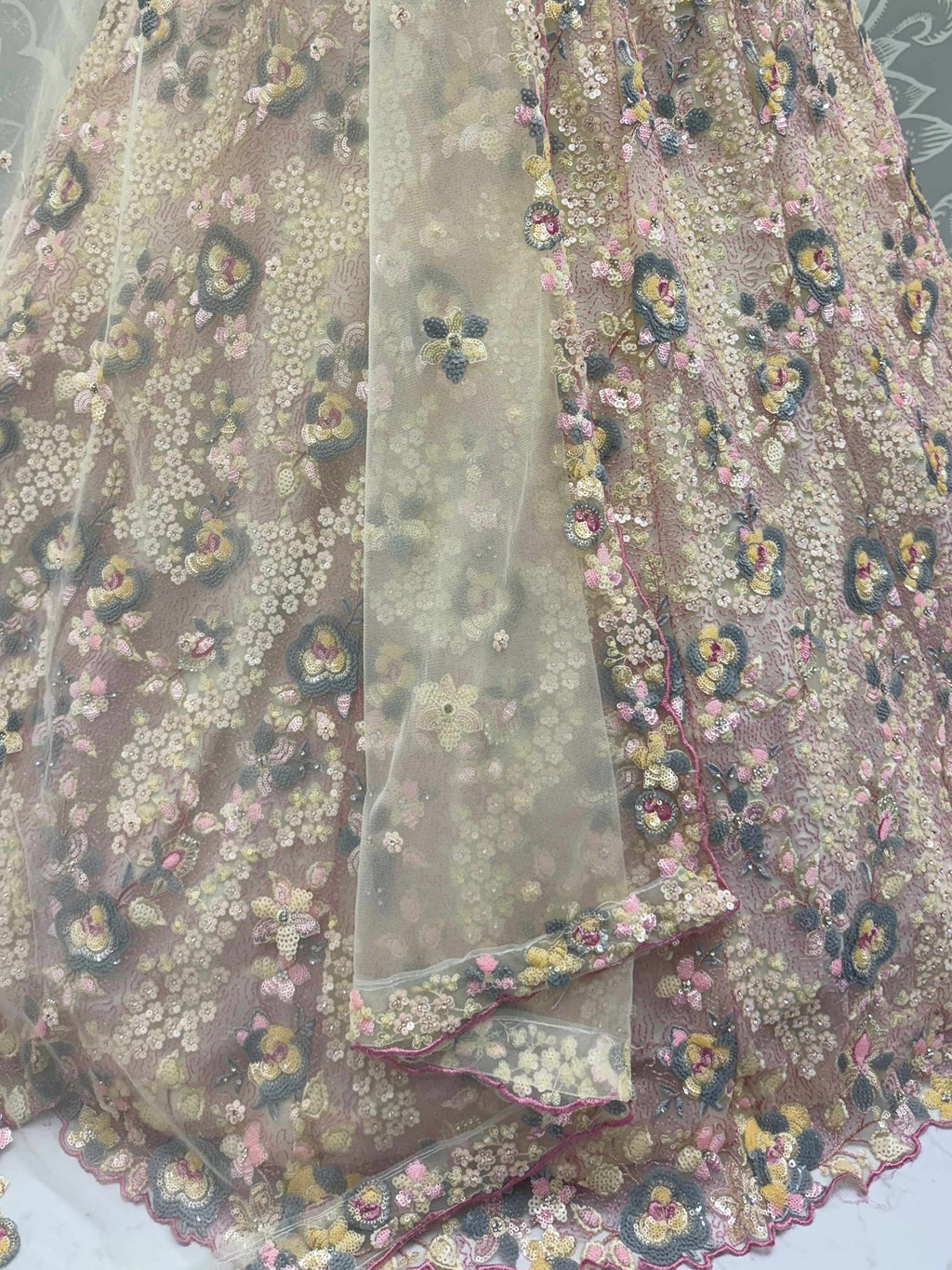 Bewitching Beige Net Embroidered Wedding Wear Lehenga Choli