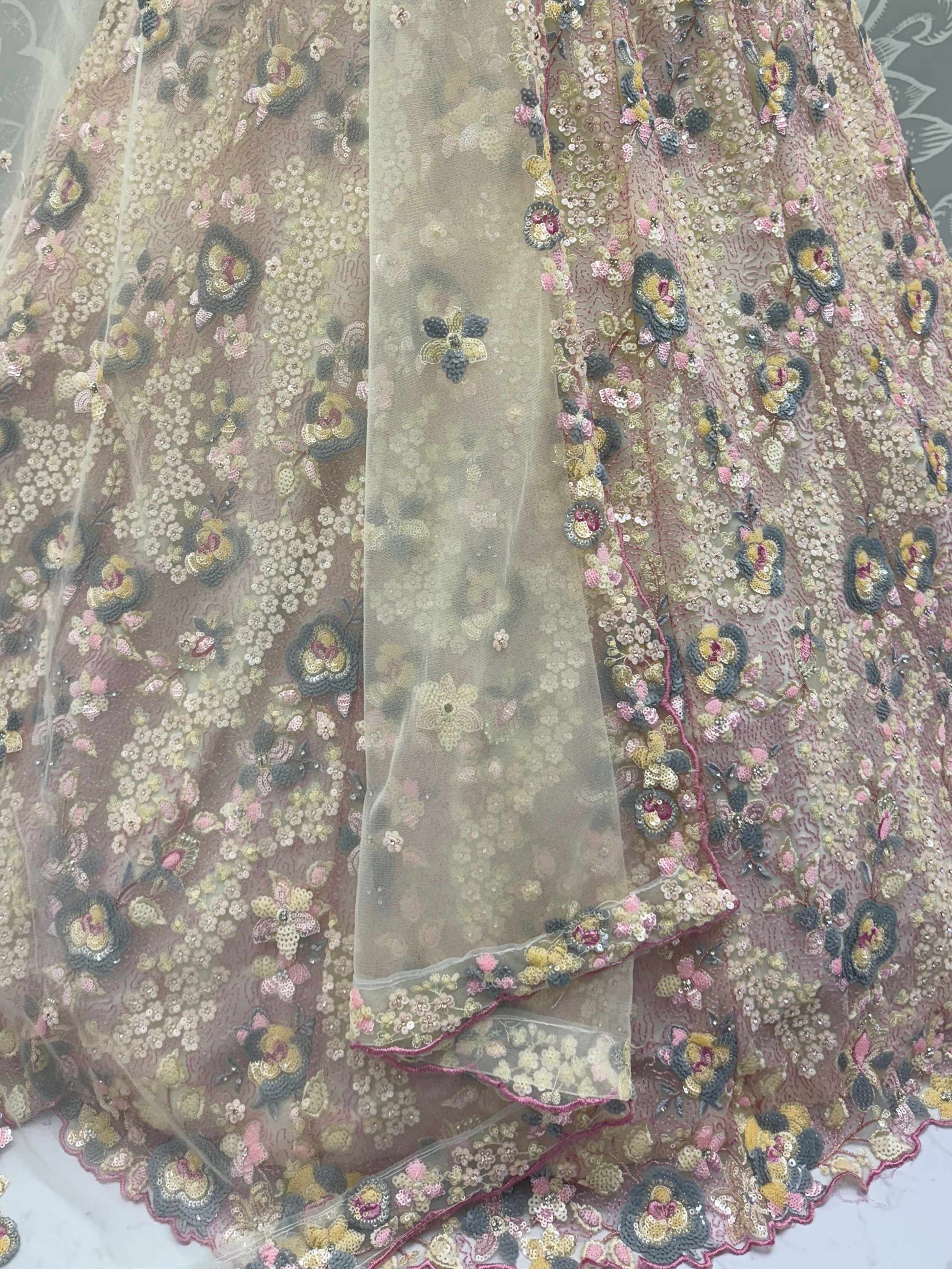 Bewitching Beige Net Embroidered Wedding Wear Lehenga Choli