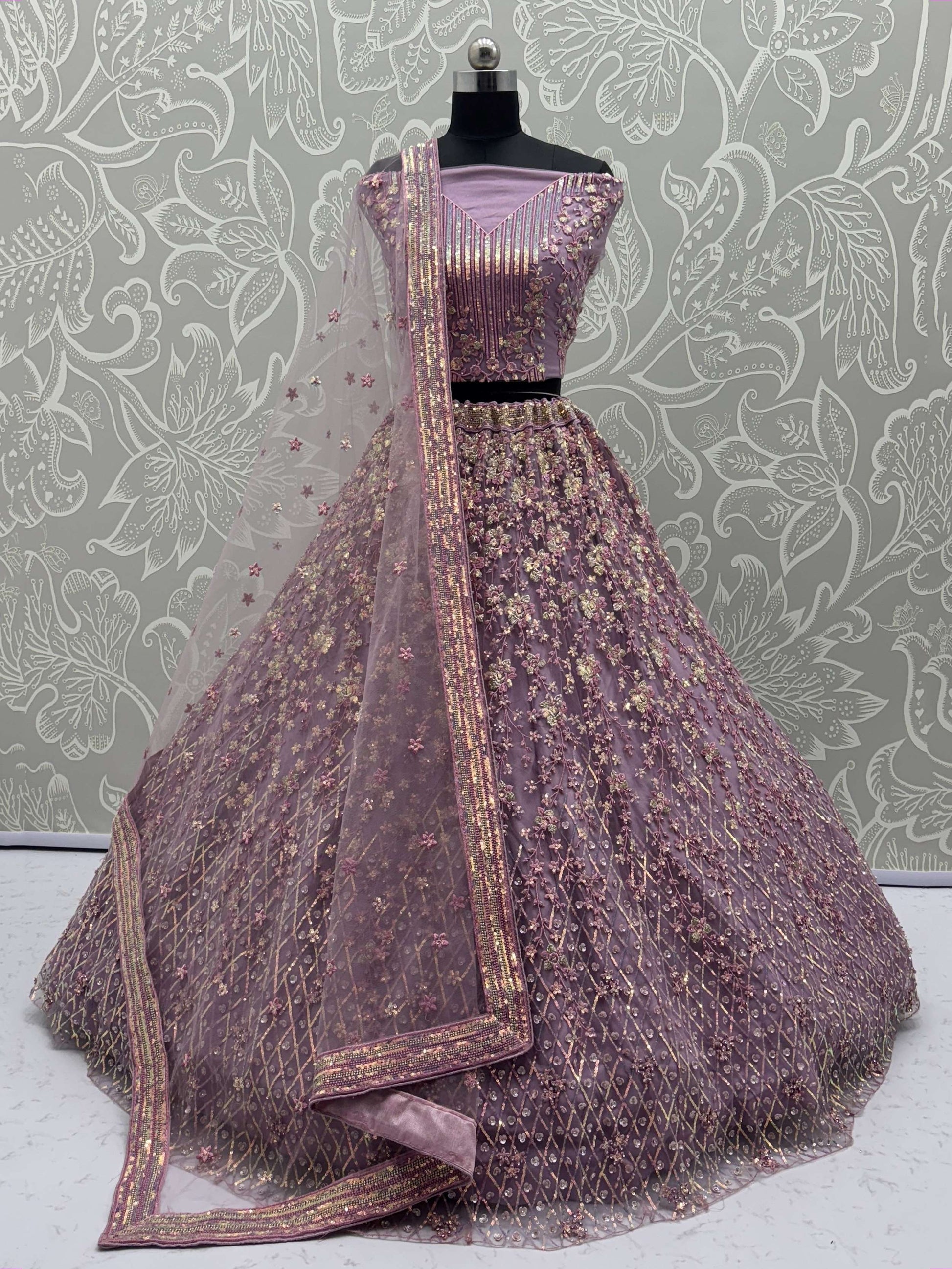 Alluring Lavender Net Zircon Work Lehenga Choli With Dupatta