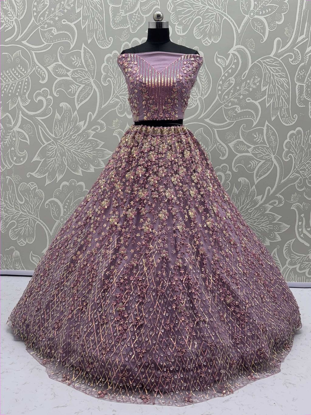 Alluring Lavender Net Zircon Work Lehenga Choli With Dupatta