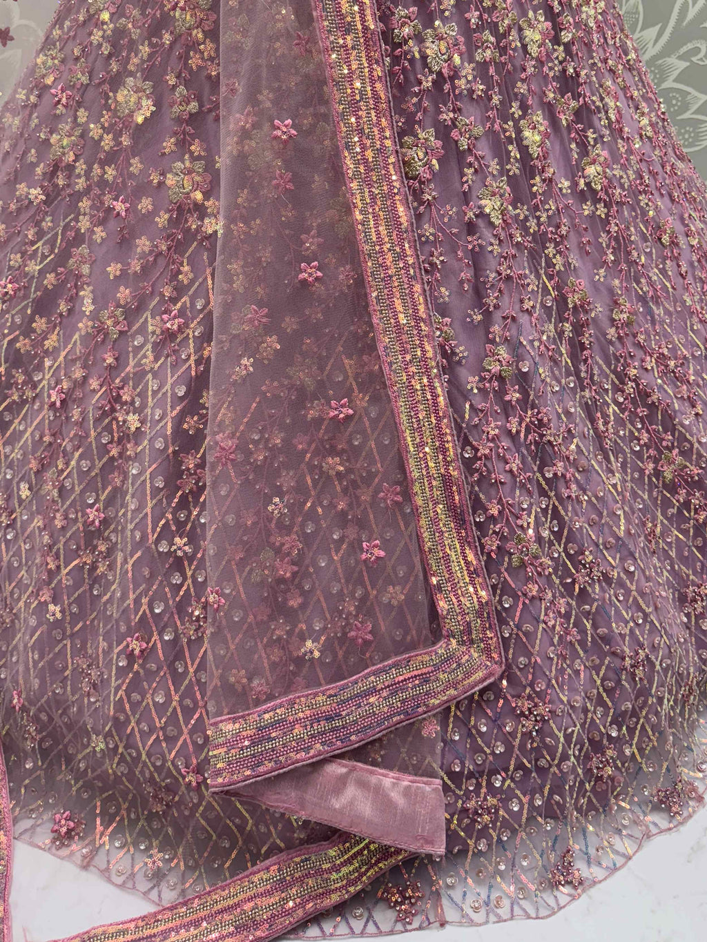 Alluring Lavender Net Zircon Work Lehenga Choli With Dupatta