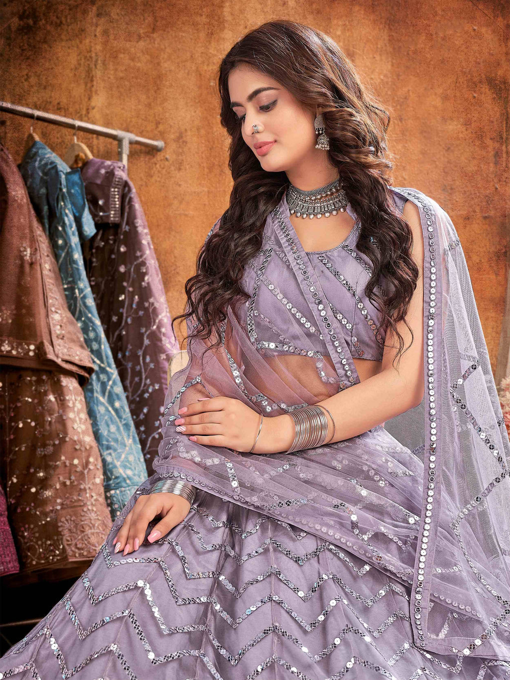 Glamorous Lavender Net Sequins Wedding Wear Lehenga Choli With Dupatta