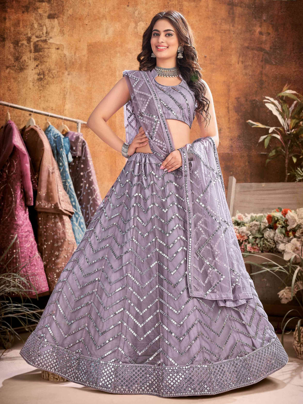 Glamorous Lavender Net Sequins Wedding Wear Lehenga Choli With Dupatta