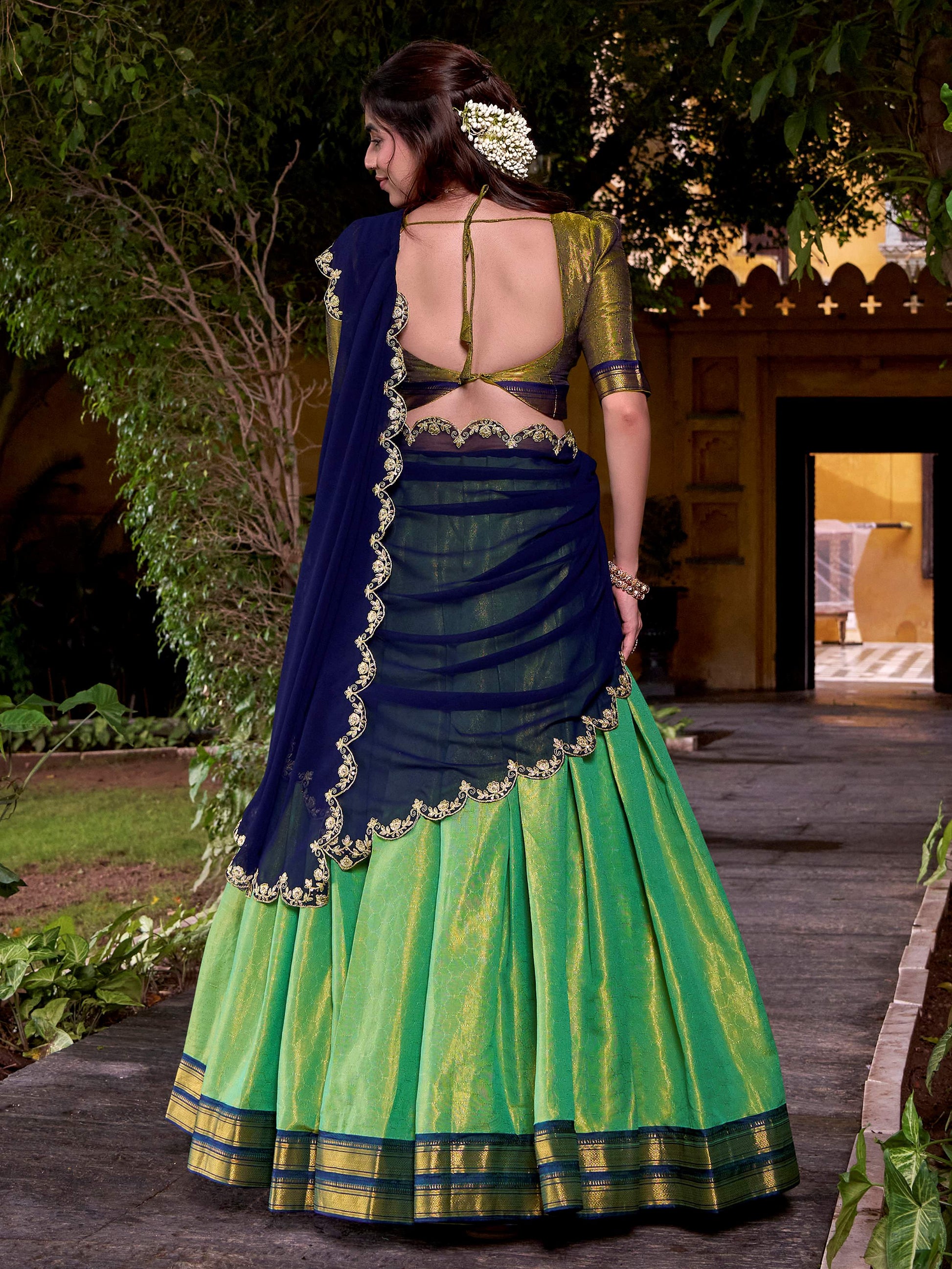 Magnetic Green Kanchipuram Silk Zari Weaving Half Saree Lehenga