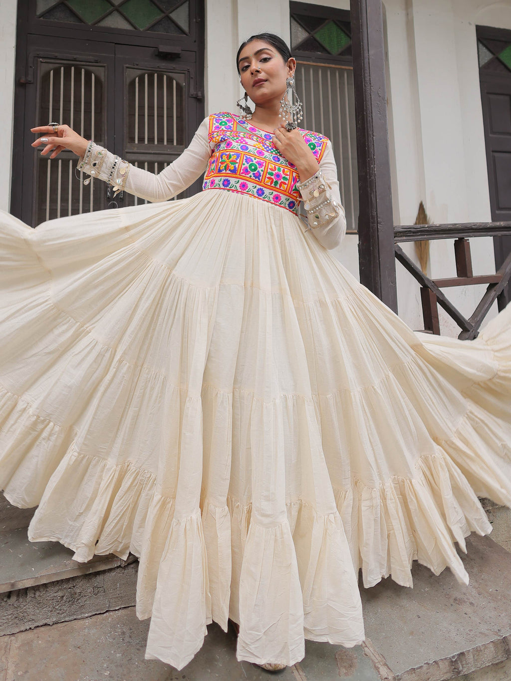 Alluring Off White Cotton Embroidered Navratri Special Gown
