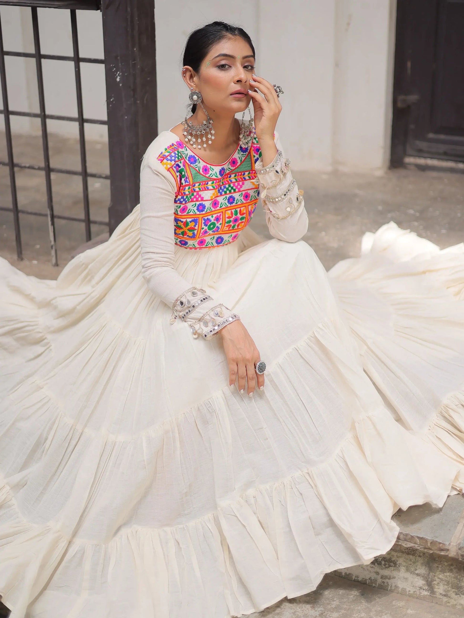 Alluring Off White Cotton Embroidered Navratri Special Gown