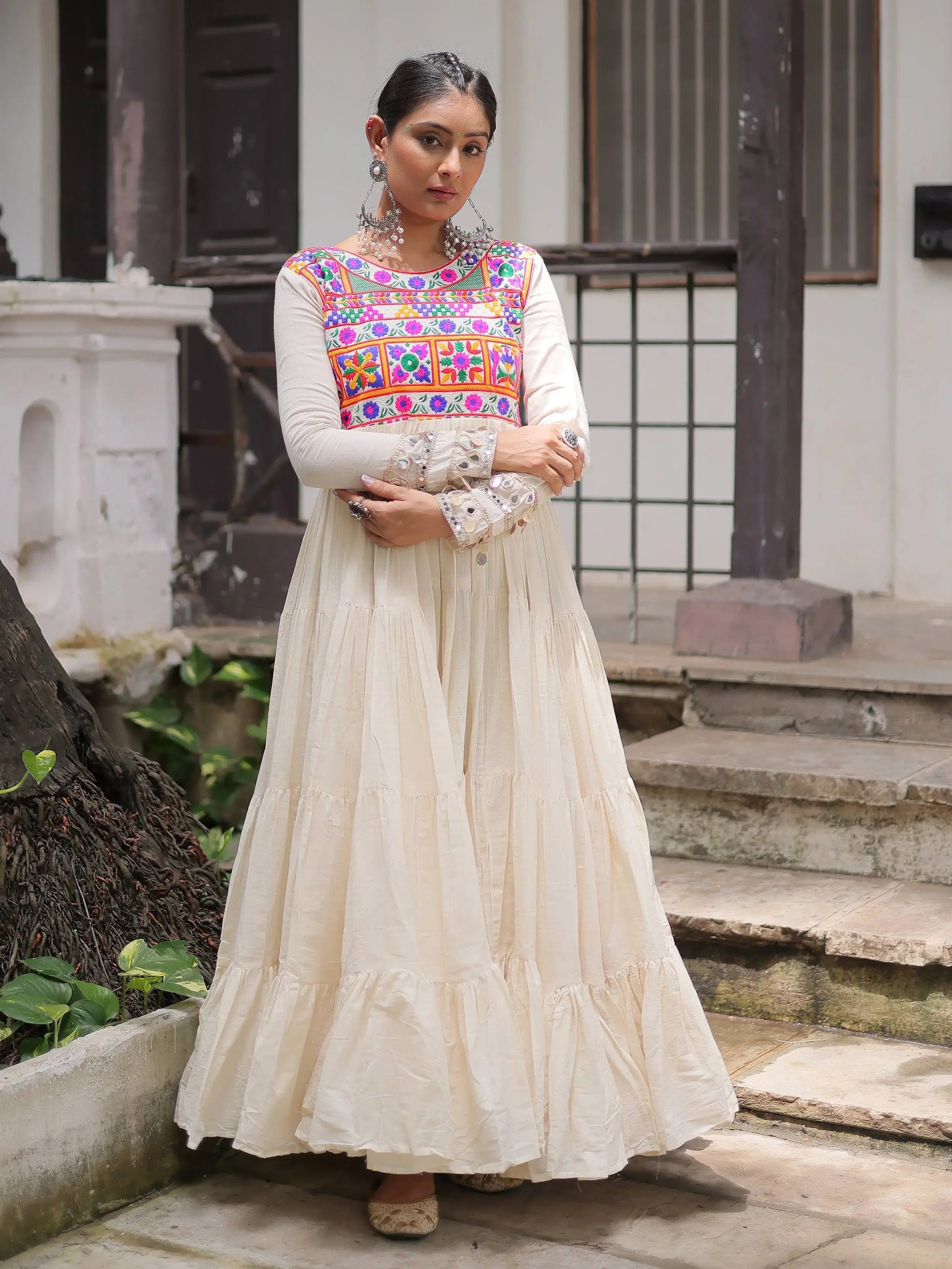 Alluring Off White Cotton Embroidered Navratri Special Gown