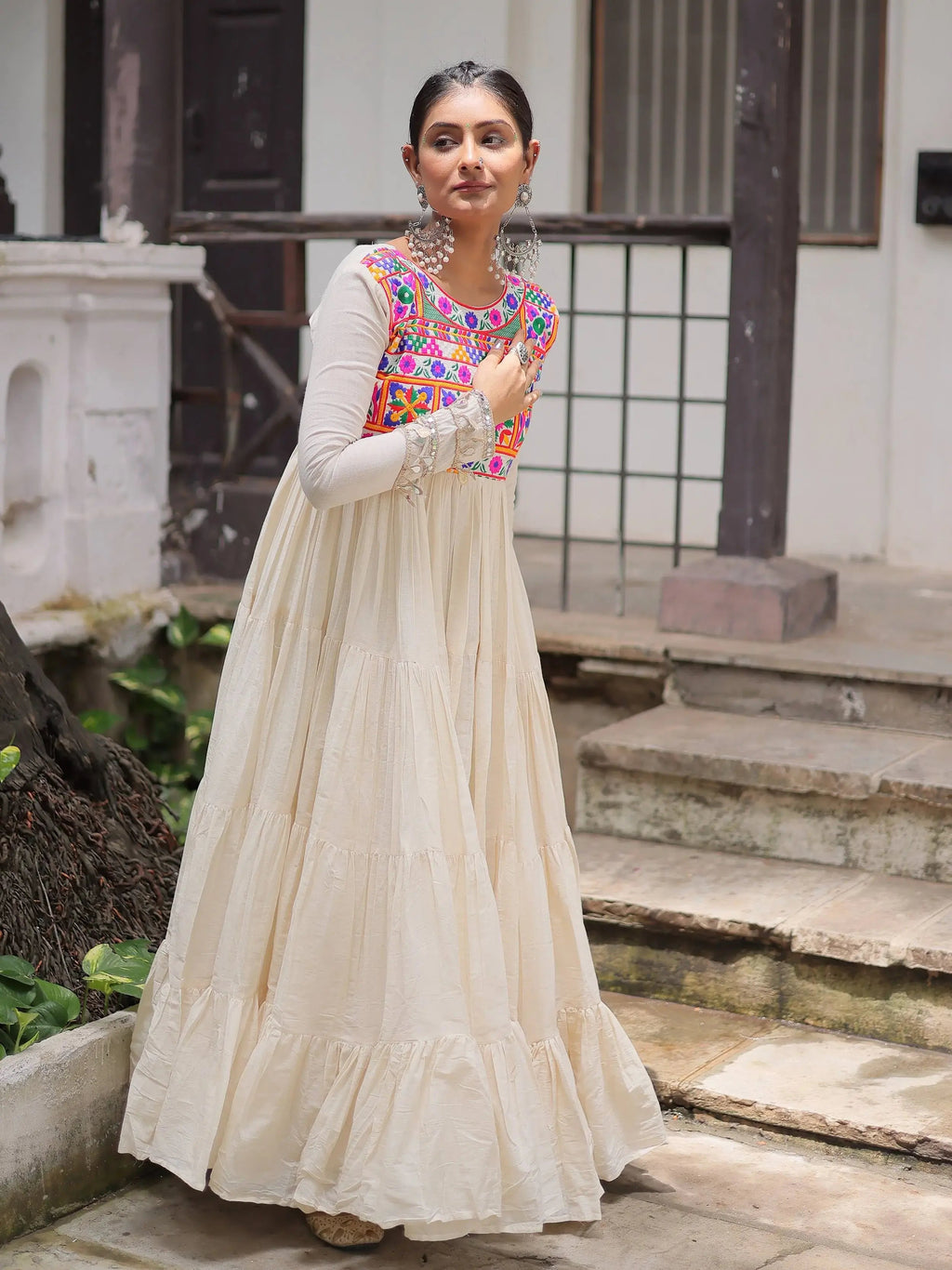 Alluring Off White Cotton Embroidered Navratri Special Gown