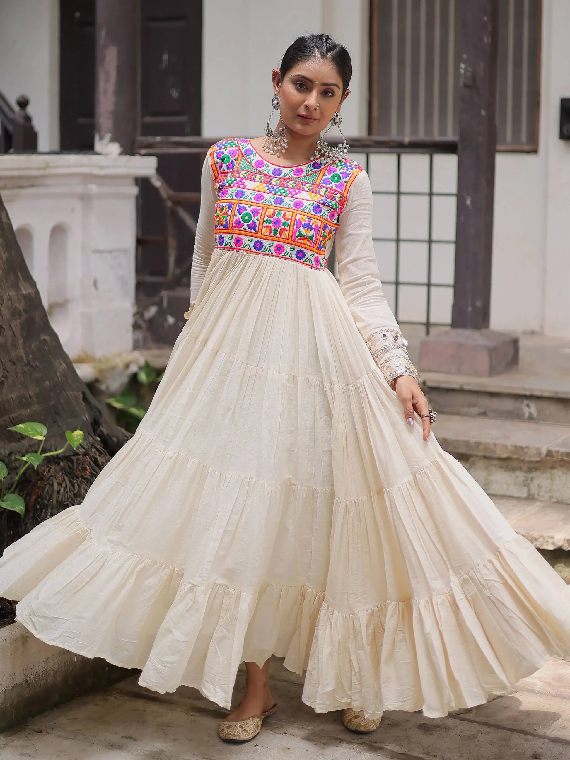 Alluring Off White Cotton Embroidered Navratri Special Gown