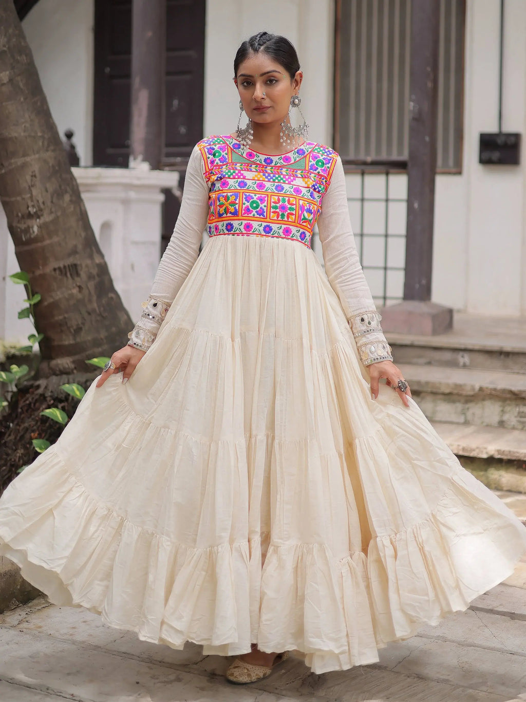 Alluring Off White Cotton Embroidered Navratri Special Gown