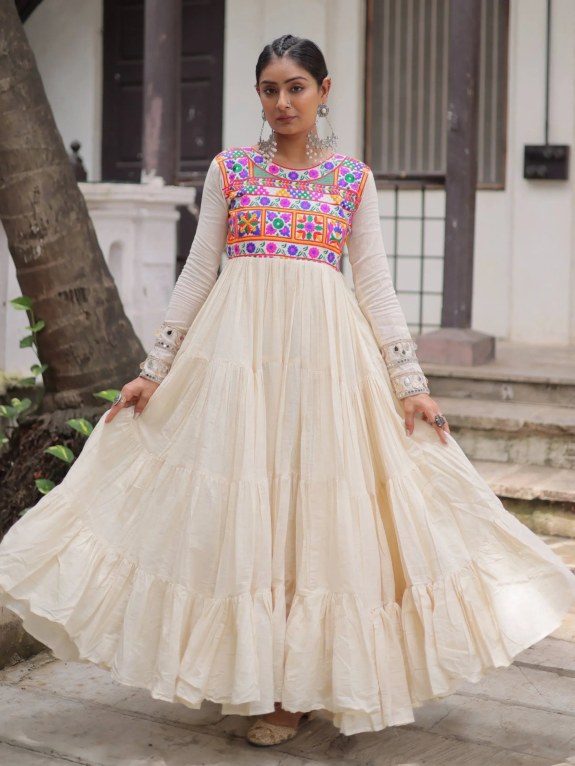 Alluring Off White Cotton Embroidered Navratri Special Gown