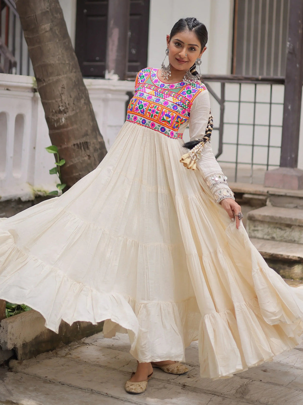 Alluring Off White Cotton Embroidered Navratri Special Gown