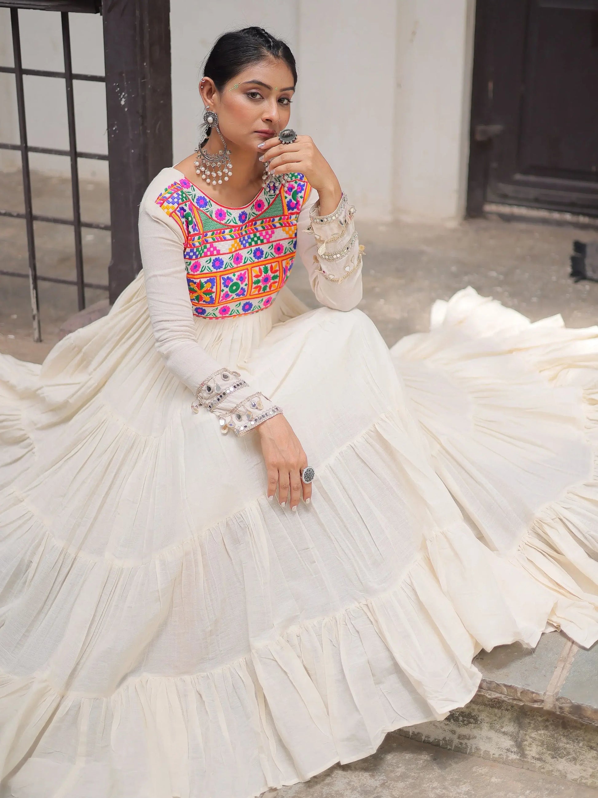 Alluring Off White Cotton Embroidered Navratri Special Gown