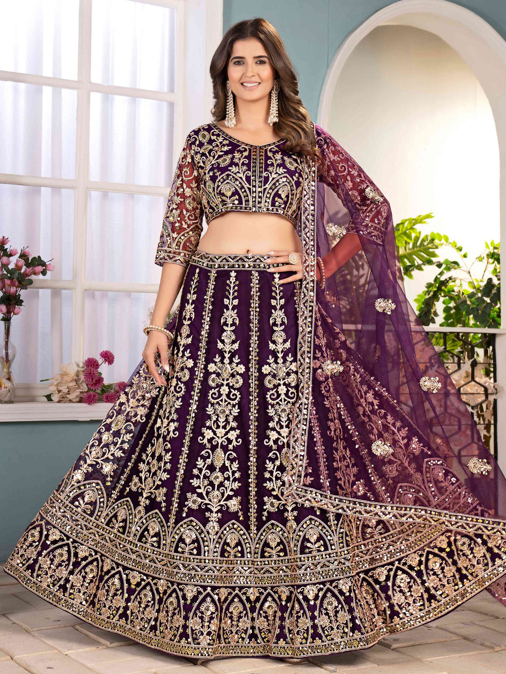 Captivating Wine Net Sequins Embroidered Bridesmaid Lehenga Choli