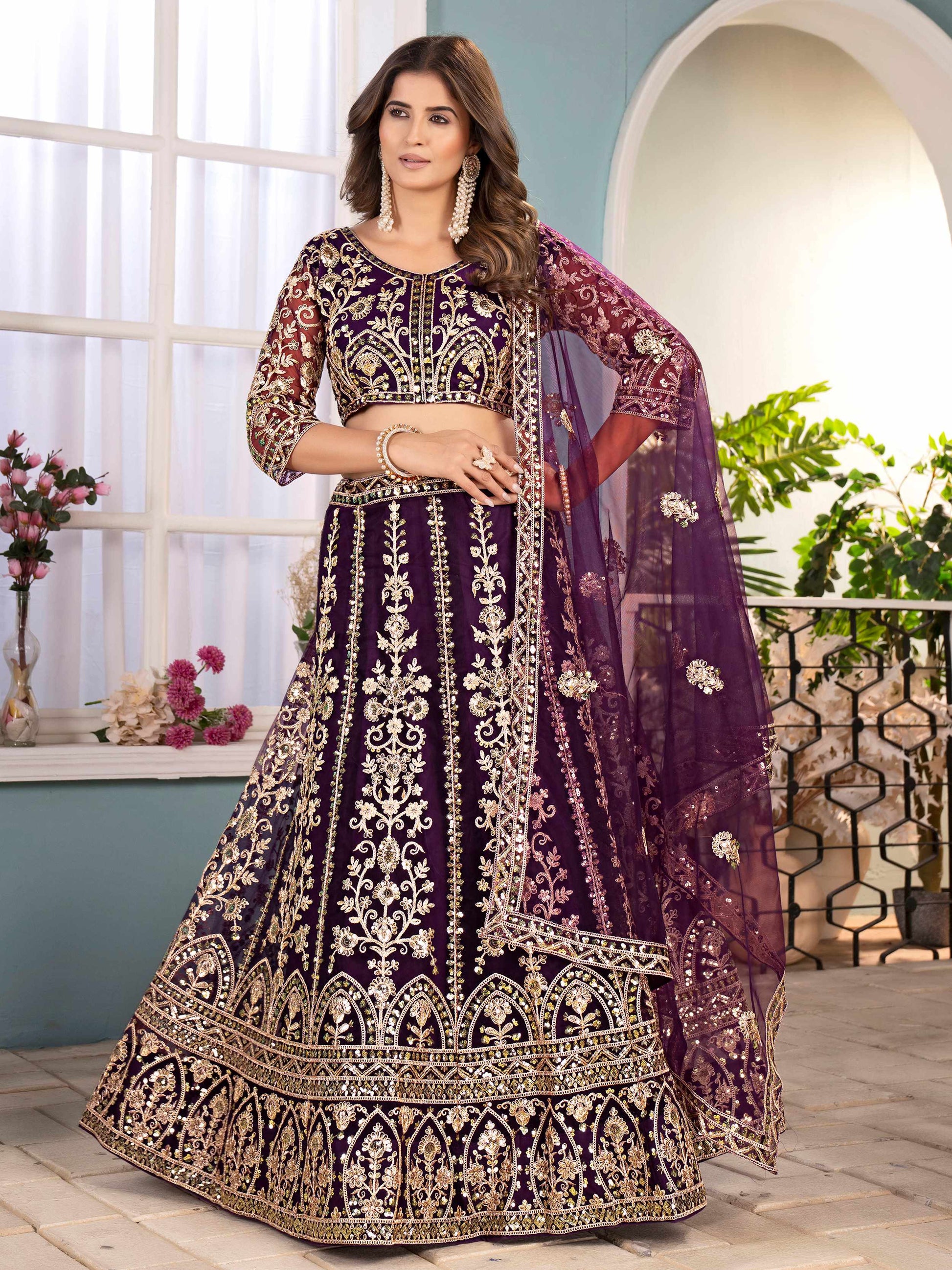 Captivating Wine Net Sequins Embroidered Bridemaids Lehenga Choli