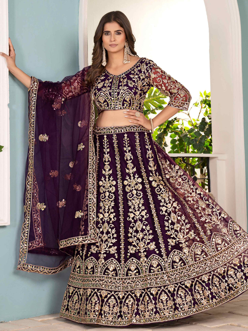Captivating Wine Net Sequins Embroidered Bridesmaid Lehenga Choli