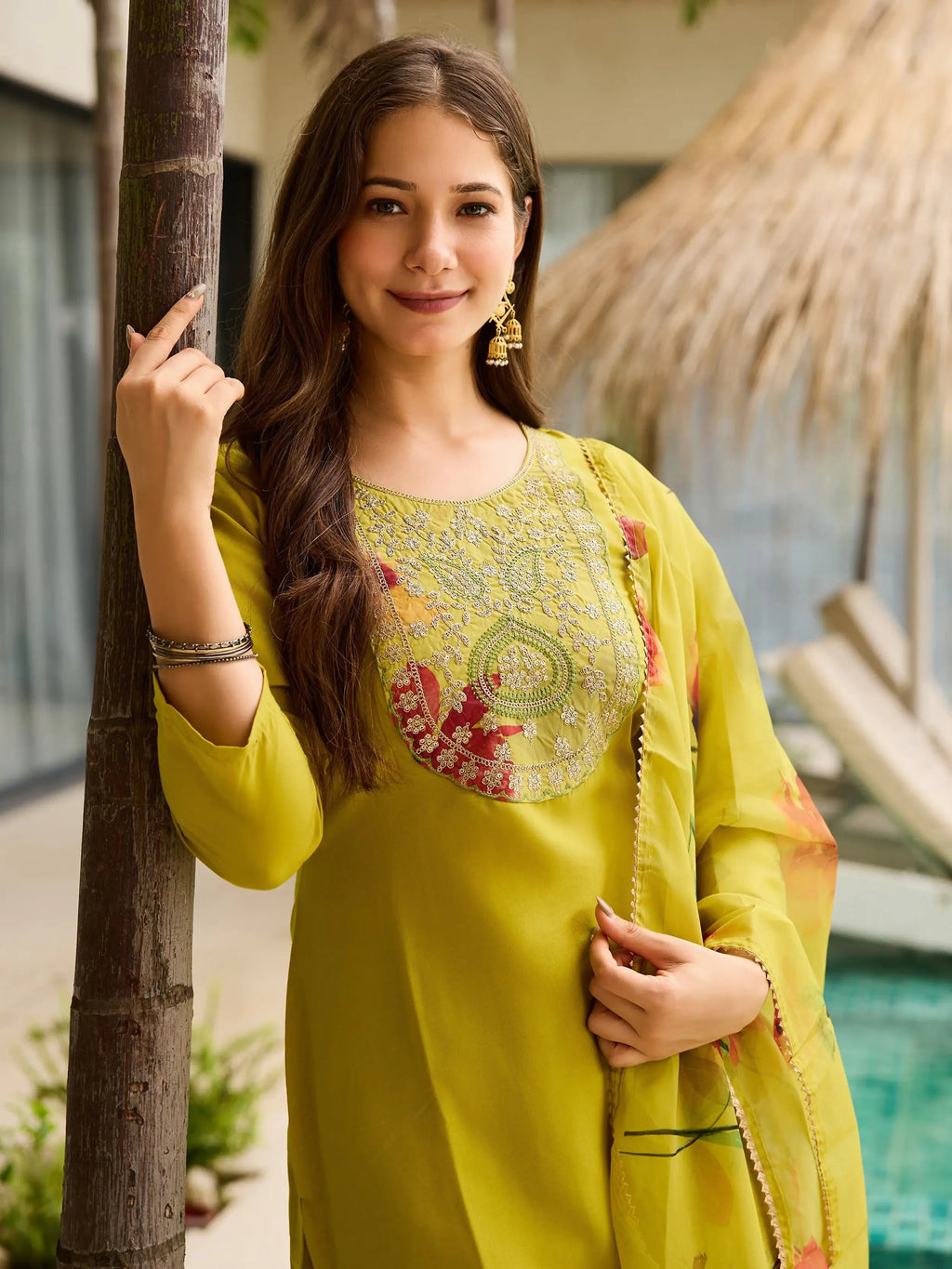 Adorning Yellow Rayon Embroidered Suit With Floral Printed Dupatta