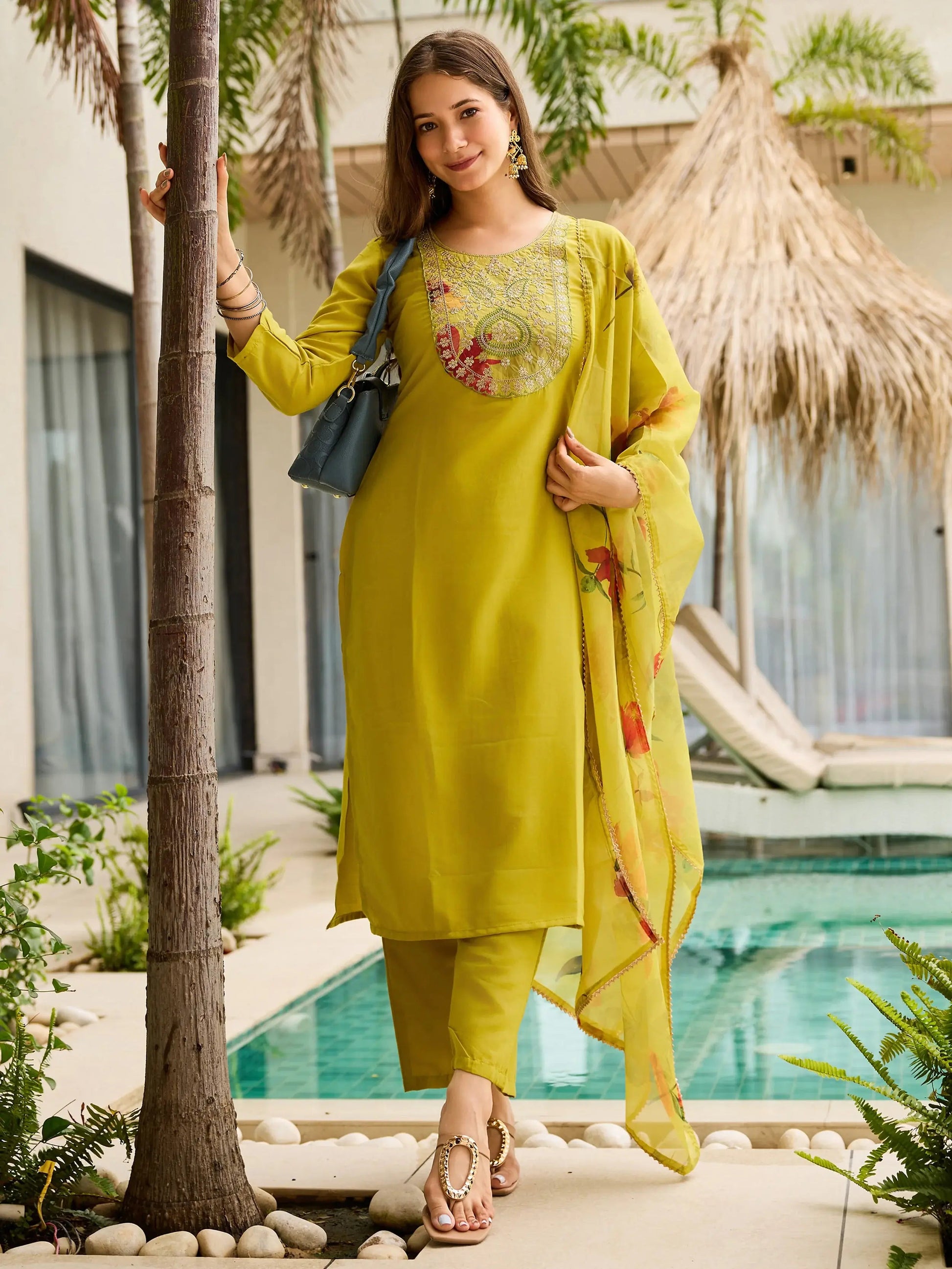 Adorning Yellow Rayon Embroidered Suit With Floral Printed Dupatta
